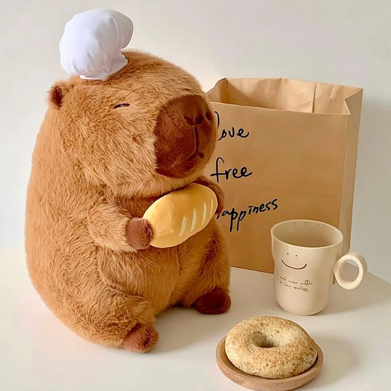 Capybara Plush with Cooking Chef Hat Holding Baguette 9.8 inch Cute Bread Capibara Stuffed Animal Ultra Soft Plushies Toys Kawaii Gifts for Kids Brown