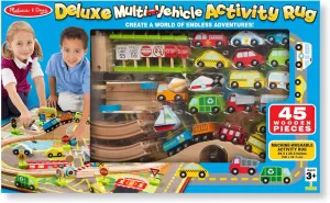 Melissa & Doug Deluxe Multi-Vehicle Activity Rug (39.5" x 36.5") - 19 Vehicles, 12 Wooden Signs, Train Tracks