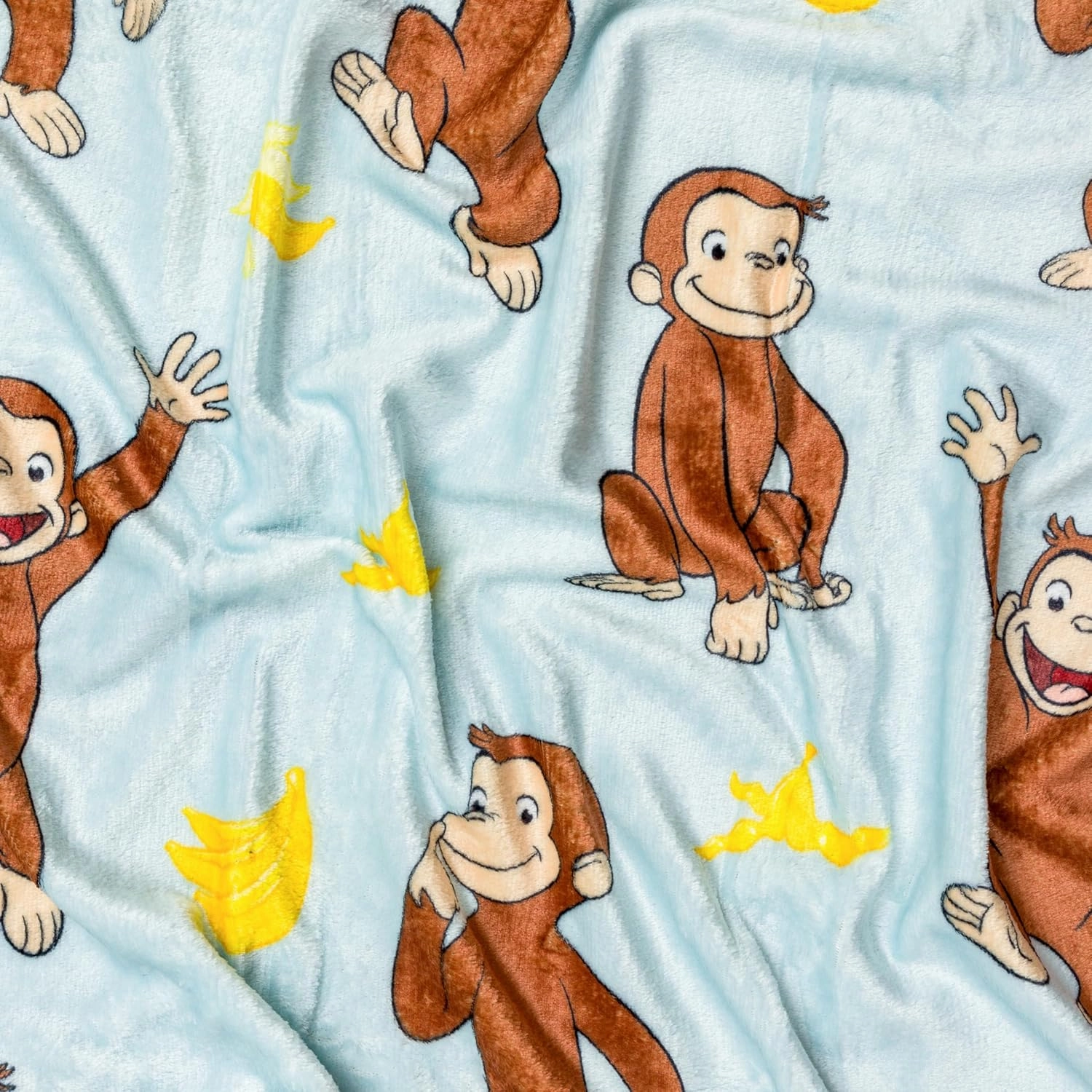 Silver Buffalo Curious George Monkey Banana 45" x 60" Fleece Throw, Soft and Cozy Blanket, 185 GSM